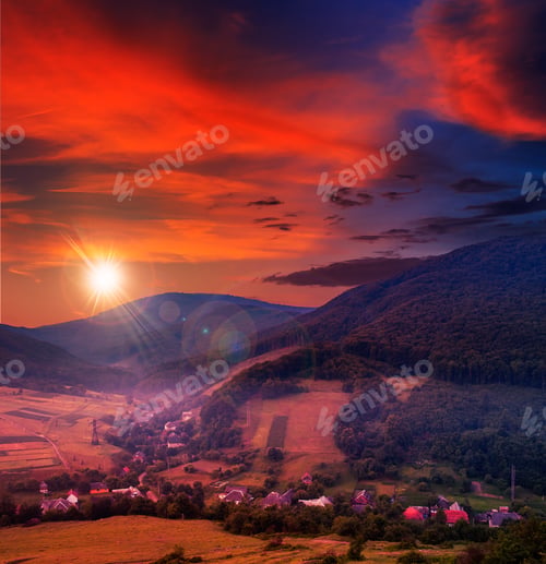 Preview: Autumn Landscape. Village On The Hillside. Forest On The Mountain Covered With Red And Yellow