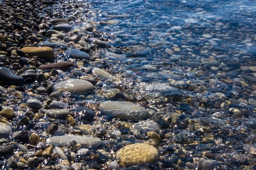 Preview: Sea Pebble Beach With Multicoloured Stones, Transparent Waves With Foam, On A Warm Summer Day