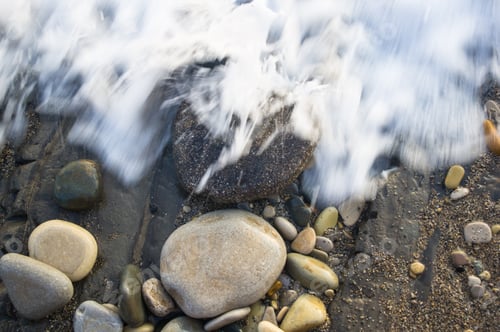 Preview: Pebble Stones On The Sea Beach, The Rolling Waves Of The Sea With Foam