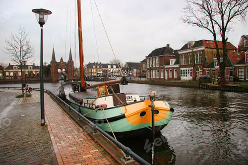 Preview: Historical Boat At Quay Near Water Gate Entrance Of Fortified City
