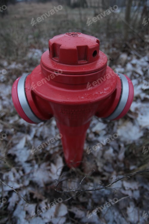 Preview: Close Up Of A Red Fire Hydrant With White Lines, Outdoors On A Winter Day In Poland, Europe