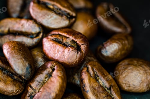 Preview: Brown Roasted Coffee Beans On Black Background, Close Up, Macro