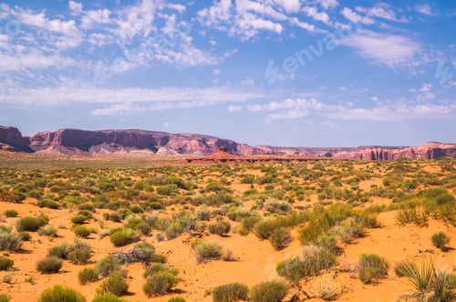 Preview: Monument Valley In Utah, Usa. Desert Under The Blue Sky