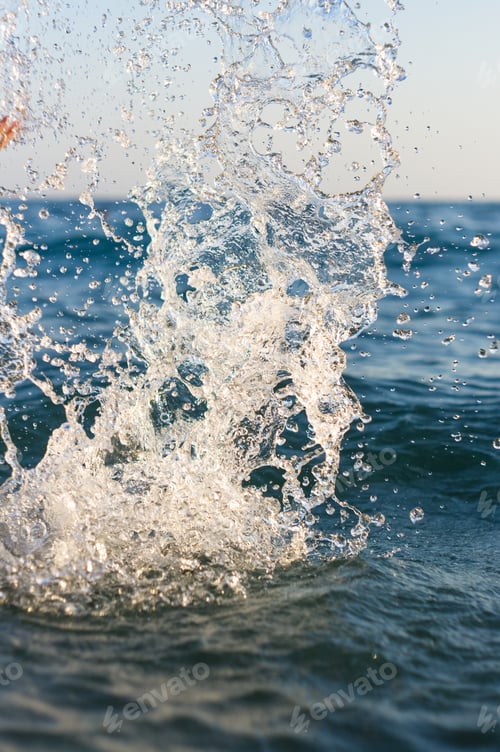 Preview: Large Transparent Splashes Sea Water On A Sunny Day