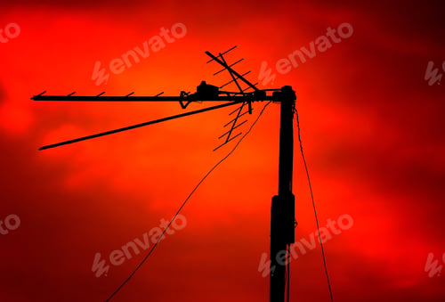 Preview: Tv Antenna On The Red Sunset Sky Background