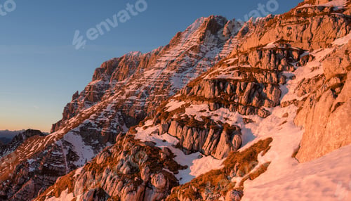 Preview: Sunset In The Mountains Above Pecol Meadow In Italy Above Mountain Pass Sella Nevea.