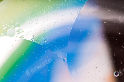 Preview: Abstract Background Of Oil Droplets On Water Surface. Beautiful And Colorful Macro Abstraction