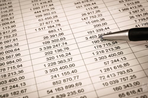 Preview: Businessman Showing A Diagram On A Financial Report Using A Pen