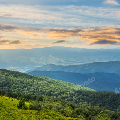 Preview: Slope Of Mountain Range With Coniferous Forest And Village Slope At Sunrise