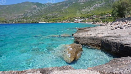 Preview: Photo From Beach With Turquoise And Emerald Clear Waters Located In Greek Island