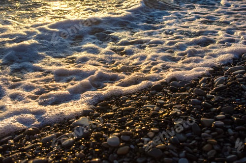 Preview: Sea Pebble Beach With Multicoloured Stones, Transparent Waves With Foam, On A Warm Evening
