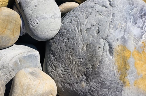 Preview: Boulders And Colorful Pebbles On The Beach On A Warm Summer Day