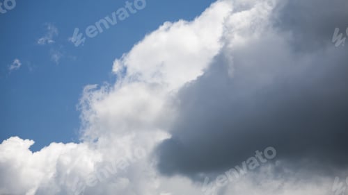 Preview: Beautiful, Fluffy, White And Grey Clouds And Blue Sky