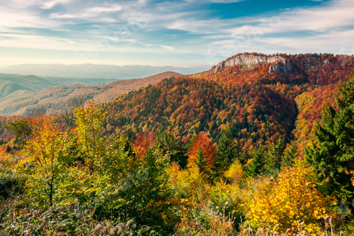 Preview: Beautiful Landscape In Mountains Of Romania. Cliff Above The Forest In Fall Color. Beautiful View