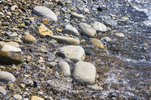 Preview: Sea Pebble Beach With Multicoloured Stones, Transparent Waves With Foam, On A Warm Summer Day