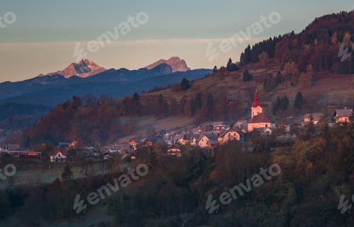 Preview: Sunrise In Slovenian Countryside With Village Zasip Below Triglav And Julian Alps.