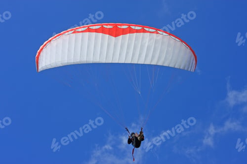 Preview: Paraglider In A Blue Sky
