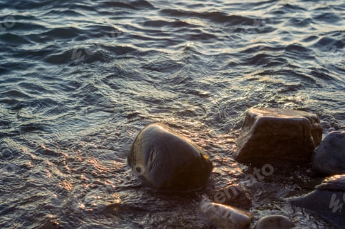 Preview: Pebble Stones On The Sea Beach, The Rolling Waves Of The Sea With Foam
