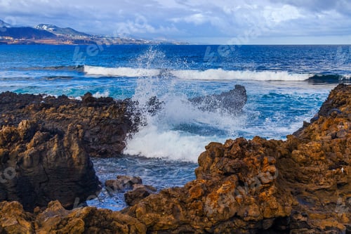 Preview: The Picturesque Rock At The Coast Of The Atlantic Ocean Is Washed By Waves