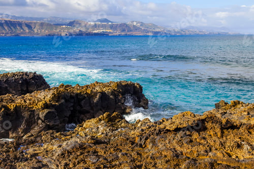 Preview: The Picturesque Rock At The Coast Of The Atlantic Ocean Is Washed By Waves