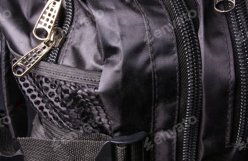 Preview: Closeup Of Buckles, Clasps, Zippers, Pockets, Fasteners, Fittings And Seams In The Black Backpack