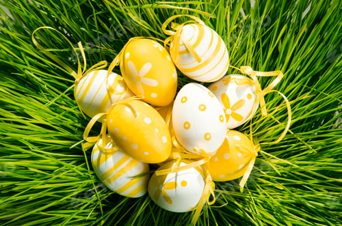 Preview: Orange And White Easter Eggs With Dots Over Green Grass