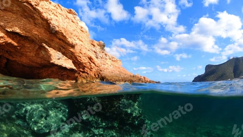 Preview: Above And Below Underwater Photo Of Tropical Exotic Island Arch Cave With Emerald Sea And Deep Blue