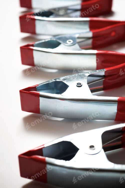 Preview: Clamps On A White Table
