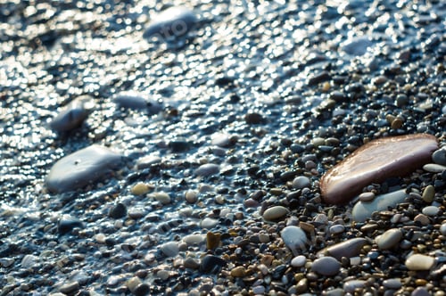 Preview: Pebble Stones On The Sea Beach, The Rolling Waves Of The Sea With Foam
