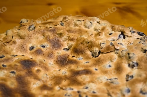 Preview: Sponge Cake With Black Currants In A White Dish On Wooden Background