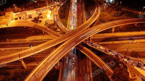 Preview: Aerial Drone Slow Shutter Night Shot Of Urban Elevated Toll Ring Road Junction And Interchange