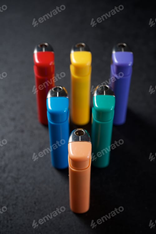 Preview: Lighters On A Black Table.