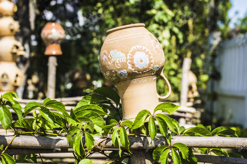 Preview: Ukrainian Village. Wooden Fence, Clay Pitchers Hanging On Wooden Fence. Ukrainian Pottery.