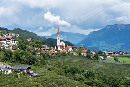 Preview: Scenic Landscape Of Mixed Pine And Deciduous Forest With A Little Village In South Tyrol