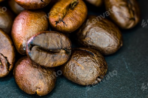 Preview: Brown Roasted Coffee Beans On Black Background, Close Up, Macro