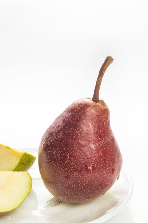 Preview: Colorful Pears And Slices In The Dish On A White Background