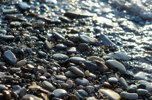 Preview: Pebble Stones On The Sea Beach, The Rolling Waves Of The Sea With Foam