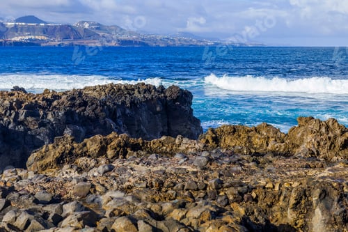 Preview: The Picturesque Rock At The Coast Of The Atlantic Ocean Is Washed By Waves