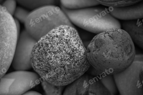 Preview: Boulders And Colorful Pebbles On The Beach