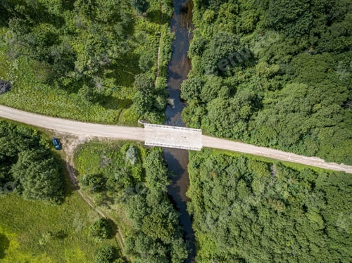 Preview: Aerial Drone View Of Small Snake River Serpentine In Forest. Green Summer Landscape Texture