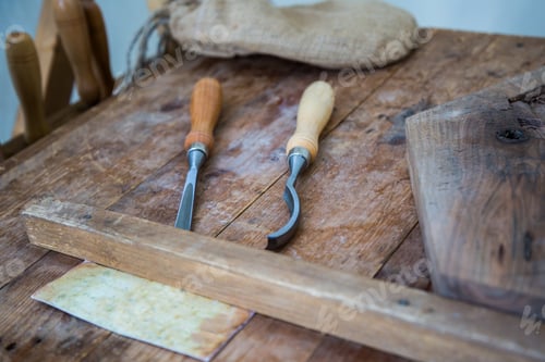 Preview: Chisel And Cutting Wood Equipment On Wooden Plank