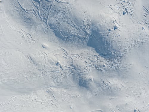 Preview: Aerial View Of Snow Covered Mountain With Impressive Structure With Trails Of Skiers. Backcountry