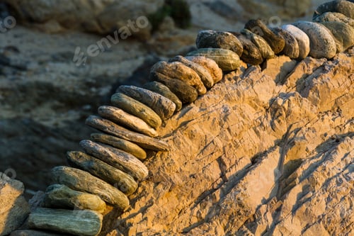 Preview: Stones Pyramides On The Beach In Sunset