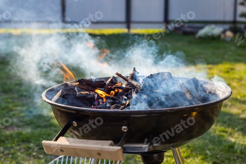 Preview: Ignite The Coals For A Barbecue In The Garden
