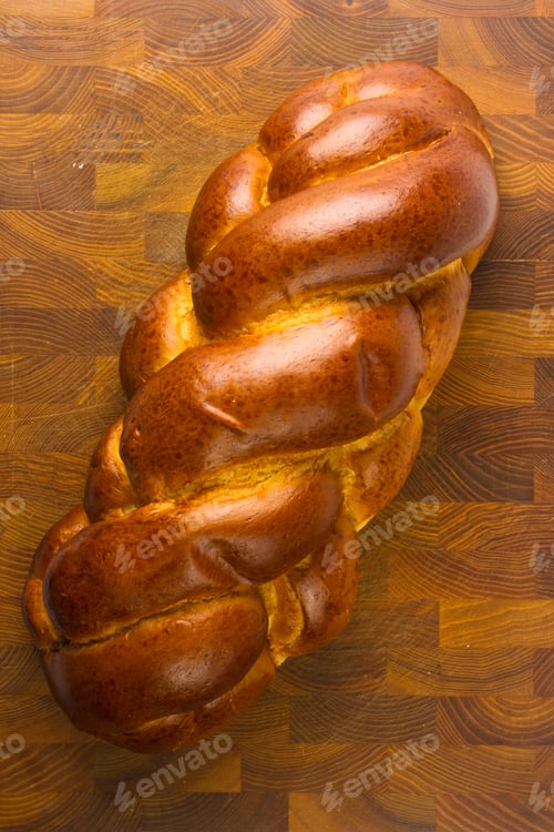 Preview: Chunks Large Braided Loaf On Wooden Background