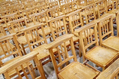 Preview: Huge Group Of Wooden Chairs Arranged In Rows.