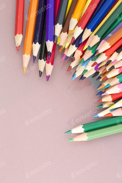 Preview: Group Of Sharp Colored Pencils With White Background And Reflexions