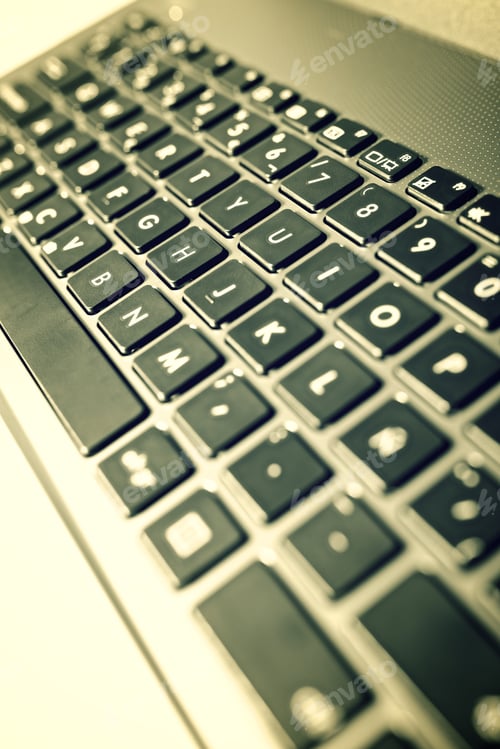 Preview: Forefront Of A Gray Laptop Keyboard.