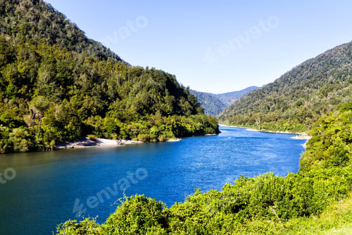 Preview: Beautiful Blue Green River Flowing On Summer Time In New Zealand South Island