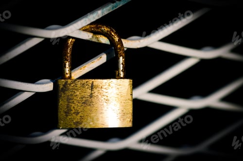 Preview: Golden Padlock On White Railing